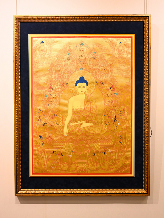 Framed Thangka Artwork : Buddha’s Radiance in Golden Hues