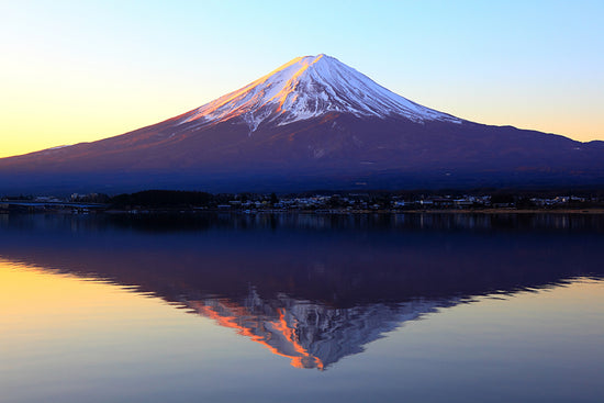 The reddish mountain Fuji and reflection